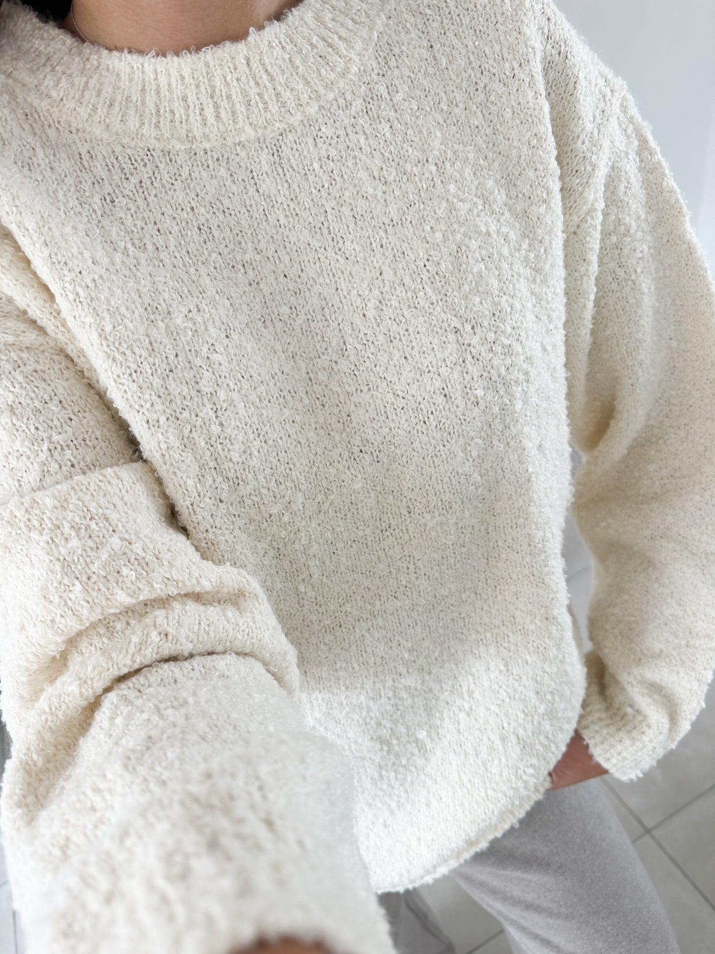 Pull bouclettes en coton écru